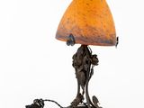 an image of a lamp that is on a table next to a cord