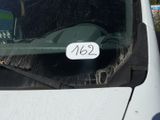 a car with a sticker on the windshield of it