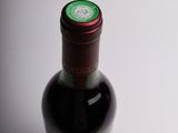 a bottle of wine that is sitting on a table