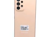 a close up of the back of an iphone 11 with a barcode sticker on it