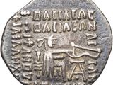 a close up of a silver coin with writing on it