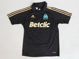 a black shirt with a yellow and blue logo on the chest
