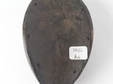 a close up of a metal object with a tag on it