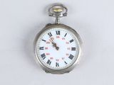 a silver pocket watch with roman numerals on the face
