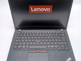 a close up of a laptop with a lenovo logo on the screen