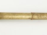 a close up of a brass telescope on a white surface