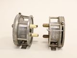 pair of vintage motor hubs on a white background