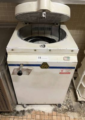 a machine that is sitting in the corner of a room