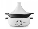 a close up of a white and black slow cooker on a white background