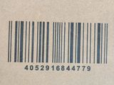 a box with a barcode on it that is sitting on a table