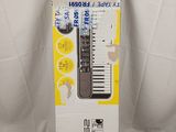 a box with a keyboard inside of it on a white surface