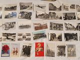 a lot of old postcards on the bed