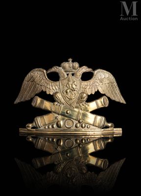 a close up of a metal object with an eagle on top of it