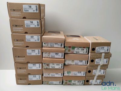 boxes stacked on top of each other on a white surface