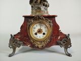 a clock that is sitting on top of a table
