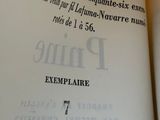 a close up of an open book with a picture on it