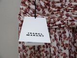 a picture of a label on a dress hanging on a hanger