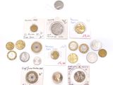 a lot of coins that are sitting on a table