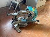 a circular saw on the floor in a room