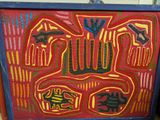 brightly colored painting of a man ' s face on a red background