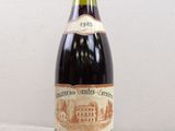 a bottle of wine that is sitting on a table