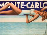 une affiche représentant une femme en maillot de bain allongée sur la plage