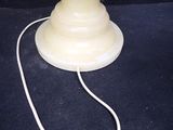 an image of a lamp that is on a table