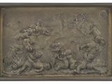 an image of a bronze plaque depicting a group of children