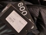a bag of luggage that has a price tag attached to it