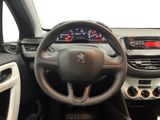 the interior of a car with a steering wheel and dashboard controls