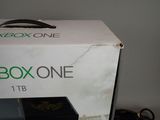 a box of xbox one sitting on top of a table