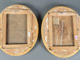 pair of antique wooden picture frames with glass inserts