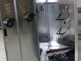 a metal box that has a bunch of items inside of it