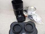 an image of a coffee maker and other items on a table