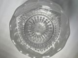 an image of a clear glass bowl with a circular design