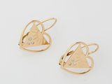 a pair of gold earrings with diamonds in the shape of a heart