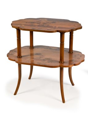 a small wooden table with two shelves on it