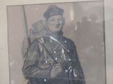 a drawing of a man in a military uniform holding a rifle