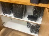 a wooden shelf with a bunch of coffee cups on it
