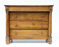 Commode en bois naturel ouvrant à quatre tiroirs en façade, …