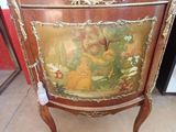 a cabinet with a painting on it in a store