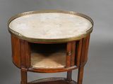 an image of a round table with a marble top
