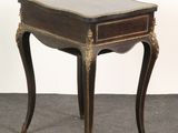an image of a small table with a drawer on it