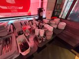 a table with a bunch of plates and cups on it