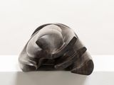 a sculpture of a helmet sitting on a ledge
