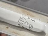 someone is holding a toothbrush in a box with a tooth brush in it