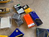 a lot of tools that are laying out on the floor
