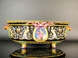 an image of a decorative bowl on a black surface