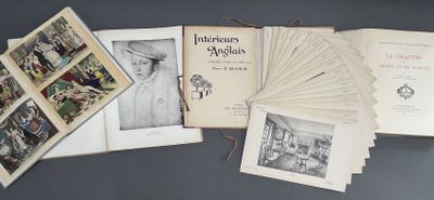 many books on the table with pictures of people in them
