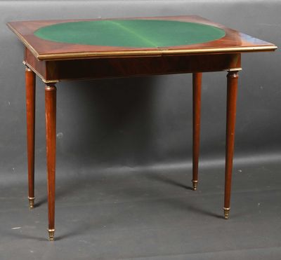 an image of a small table with a green top on a grey background